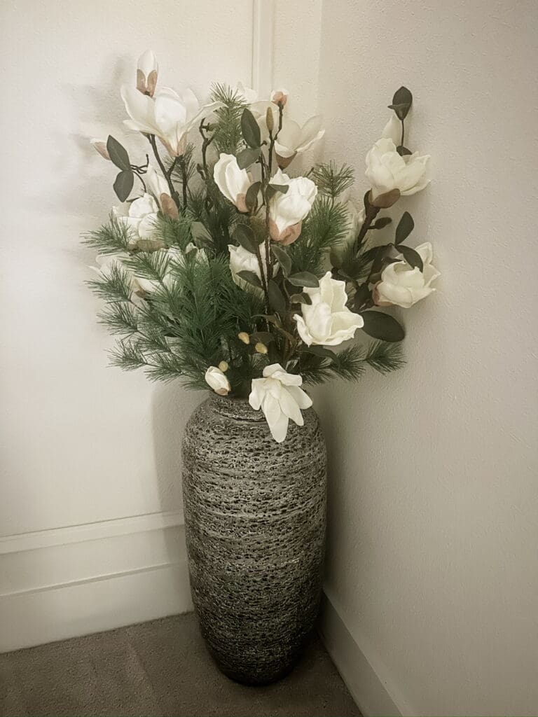 holiday magnolia and line arrangement