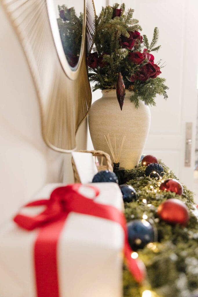 Christmas mantel garland with real-touch greenery and holiday florals